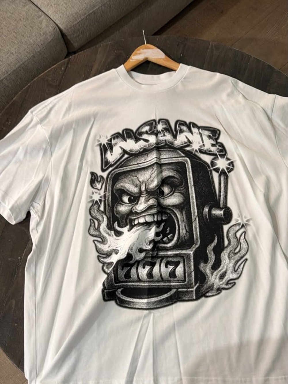 White Graphic Tee with Black Slot-Machine Flame Illustration